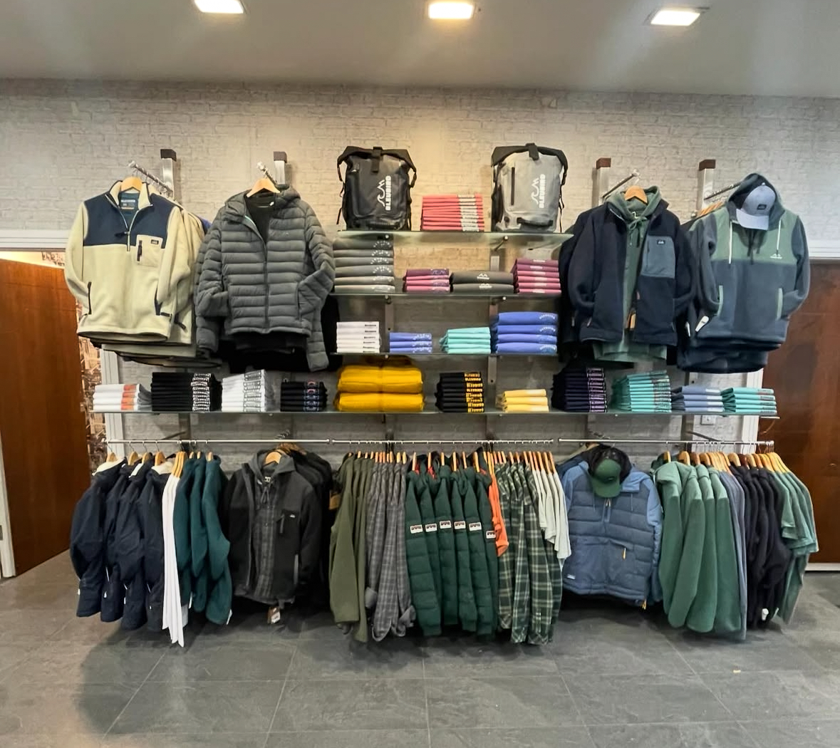 Jackets, fleeces and knitwear displayed inside Barry's Menswear in Mallow