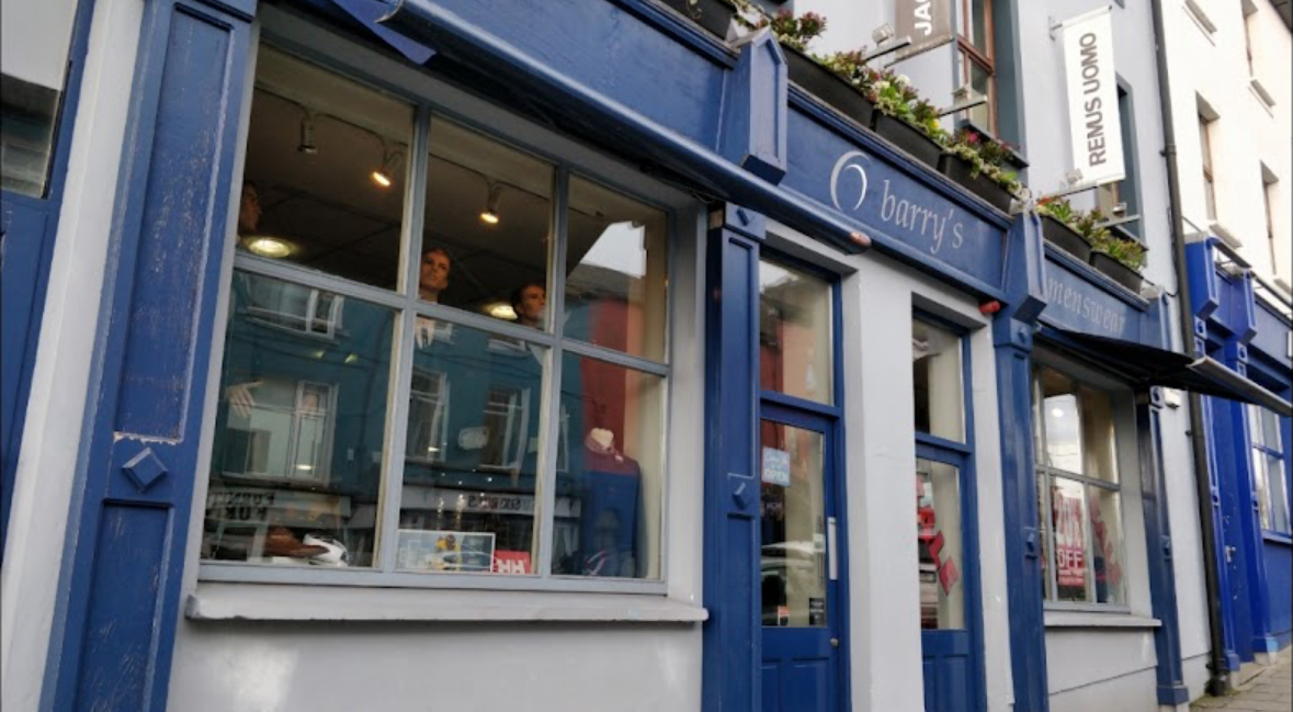Close view of the navy Barry's Menswear shopfront windows